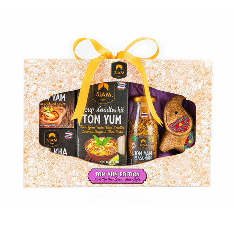 Gift set with SIAM brand products including noodles kit and seasoning on a decorative box.