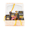 Gift set with Thai food products including 'Tom Yum' and 'Tom Kha' kits, a wooden spoon, and a small decorative item on a white background.