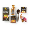 Siam brand food products including soup noodles kit, seasoning, and instant soup on a white background